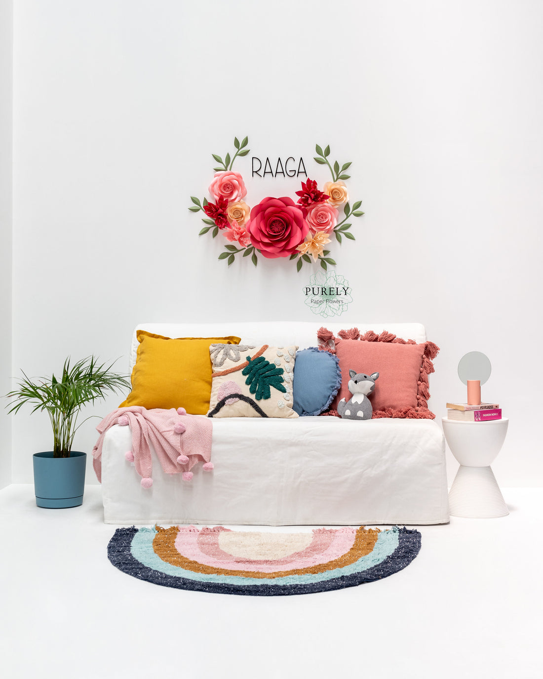 giant paper flower nursery decor above bed